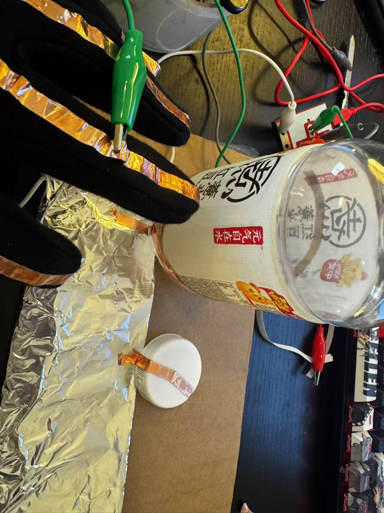 Gloves and copper wires combine to become wearable trigger devices